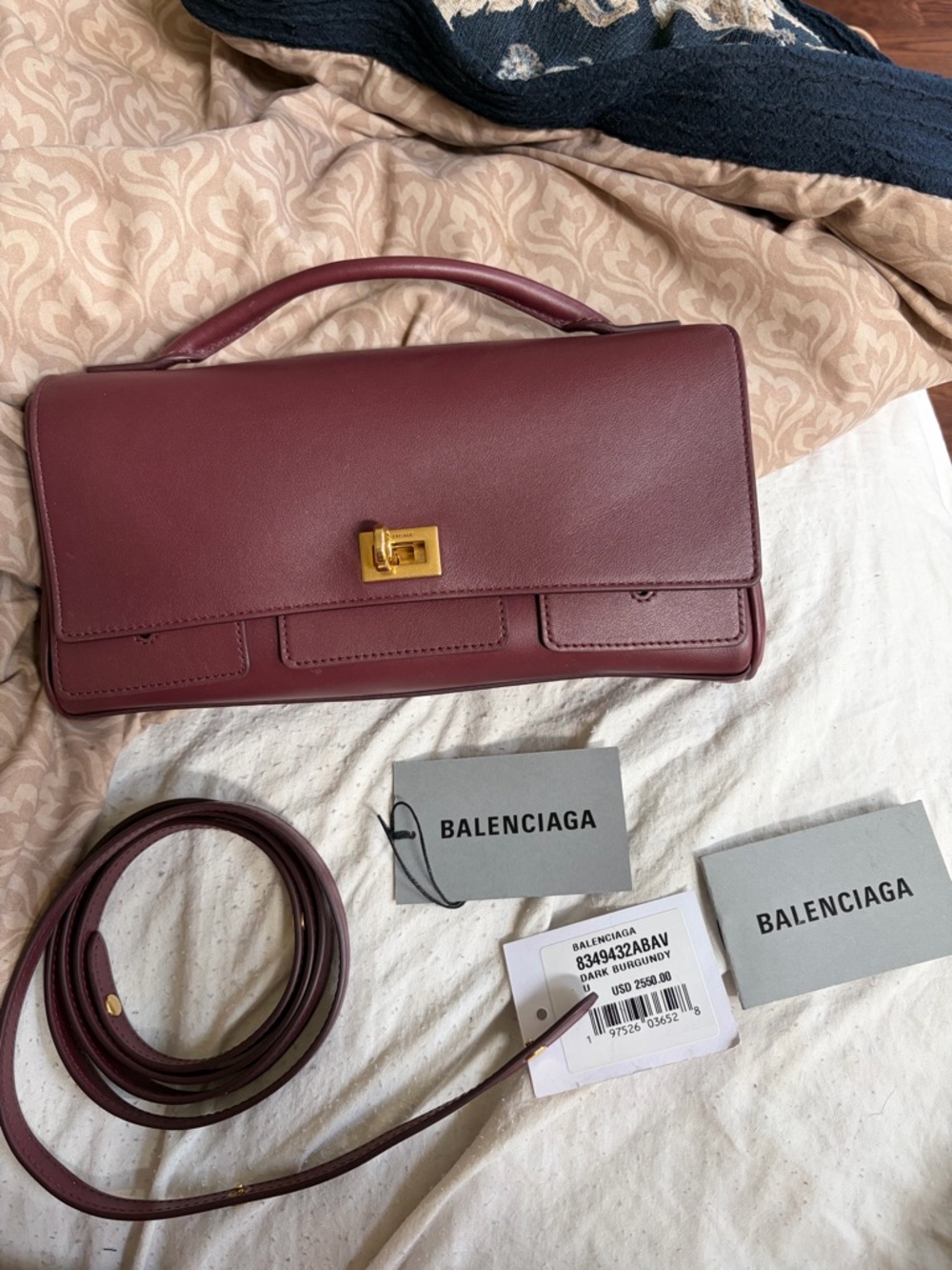 Balenciaga Dark Burgundy Leather Top-Handle Clutch with Gold Hardware